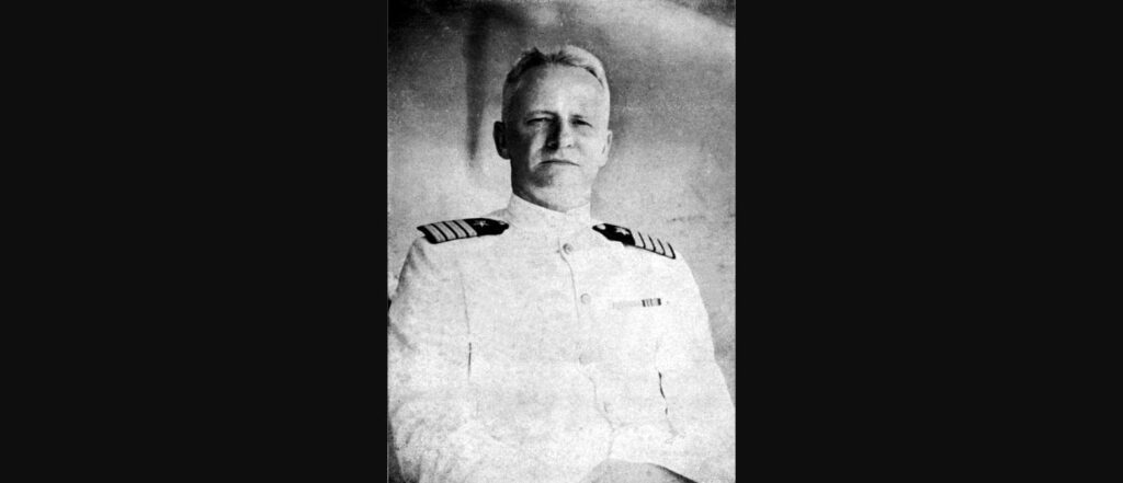 Portrait of Captain Chester W. Nimitz in white Navy uniform, 1934