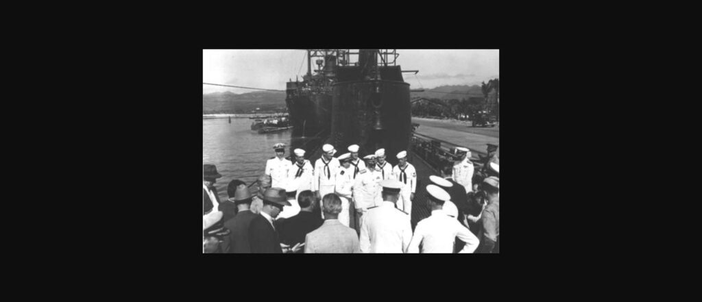 Admiral Nimitz with officers and sailors aboard USS Grayling at Pearl Harbor, December 31, 1941