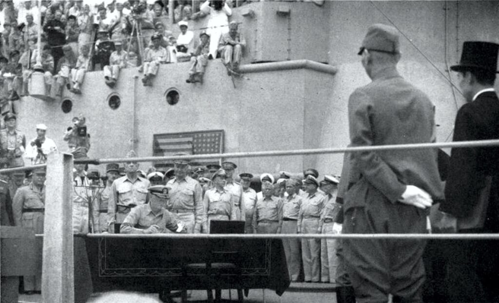 Admiral Nimitz signs the Japanese surrender aboard USS Missouri, 2 September 1945 Fleet Admiral Chester W. Nimitz signing the Japanese Instrument of Surrender aboard USS Missouri, Tokyo Bay, 2 September 1945